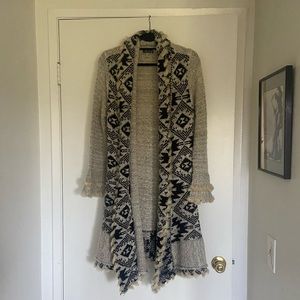 Beautiful Venus duster with fur trim detail.